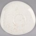 A white Schonwald porcelain saucer with brown speckled spots.