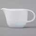 A Schonwald white porcelain sauce boat with a handle.