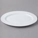 A Schonwald white porcelain oval platter with a rim.