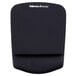 A black Fellowes PlushTouch mouse pad with a black wrist rest.