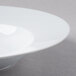 A Schonwald white porcelain bowl with a rim.