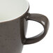 A close-up of a Schonwald dark gray porcelain coffee cup with a handle.