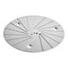 A Robot Coupe 2.5 mm grating disc, a circular metal object with holes.