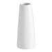 A small, white porcelain bud vase with a simple, modern design.