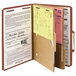 A Smead brown legal size classification folder with papers and a yellow paper.