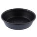 A black round pan with a white background.