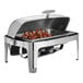 An American Metalcraft stainless steel rectangular chafer with food in it.