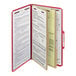 A red Smead SafeSHIELD legal size classification folder with a document inside.