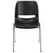 A black plastic Flash Furniture Hercules chair with metal legs and a cut out back.