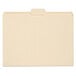 A close up of a Smead file folder with 1/5 cut tabs on a white surface.