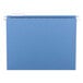 A blue Smead hanging file folder with a repositionable poly tab.