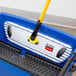 A blue Rubbermaid mop bucket with a yellow handle.