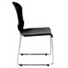 A pack of 4 black plastic Eurotech Aire chairs with chrome legs.