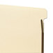 A Smead manila file folder with 2 metal fasteners.