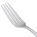 A close-up of a Libbey stainless steel dinner fork with a silver handle.