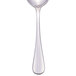 A Libbey stainless steel bouillon spoon with a silver handle.