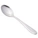 A close-up of a Libbey stainless steel teaspoon with a white background.