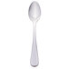 A Libbey stainless steel demitasse spoon with a silver handle.