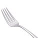 A Libbey stainless steel dessert fork with a silver handle.