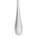 A close-up of a Libbey stainless steel salad fork with a long handle.