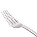 A Libbey European dinner fork with a stainless steel handle.