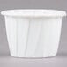 A Solo white paper portion cup.