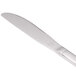 A World Tableware Columbus stainless steel knife with a fluted solid handle.