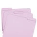 Three pink Smead file folders with lavender tabs.