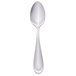 A Libbey stainless steel demitasse spoon with a silver handle.