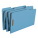 A row of blue Smead legal size fastener folders with brown labels.