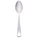 A Libbey stainless steel teaspoon with a silver handle on a white background.