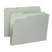 A stack of Smead letter size file folders with 1" expansion and 1/3 cut assorted tabs.