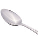 A Libbey stainless steel dessert spoon with a silver handle.