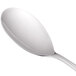 A Libbey stainless steel dessert spoon with a silver handle.