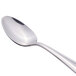 A Libbey stainless steel teaspoon with a silver handle.