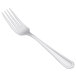 A close-up of a Libbey Cortland dessert fork with a white handle.