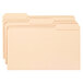 A group of Smead legal size file folders with black and white labels in three different colors.