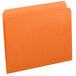 A Smead orange file folder with a white reinforced tab.