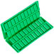 a green plastic container with many small squares