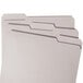 A stack of Smead letter size file folders with 1/3 cut tabs in gray