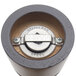 A walnut pepper mill with a metal grinder inside.