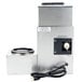 A Bloomfield automatic coffee brewer with a black and white plug.