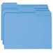 Three blue Smead file folders with assorted tabs.