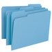 Three blue Smead file folders.
