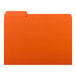 An orange rectangular Smead file folder with white labels.