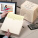 A person holding a Smead legal size file folder.