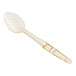 A Cambro amber plastic spoon with a perforated handle.