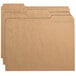 A group of brown Smead file folders with reinforced tabs.