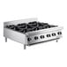A stainless steel countertop range with six burners and control knobs, designed for commercial kitchens.