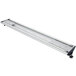 A long, rectangular curved metal light fixture with cool lighting.